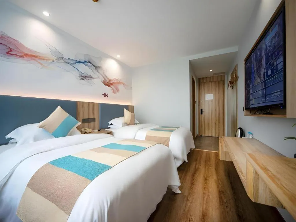 Bed in VX Hotel Hangzhou Banshan