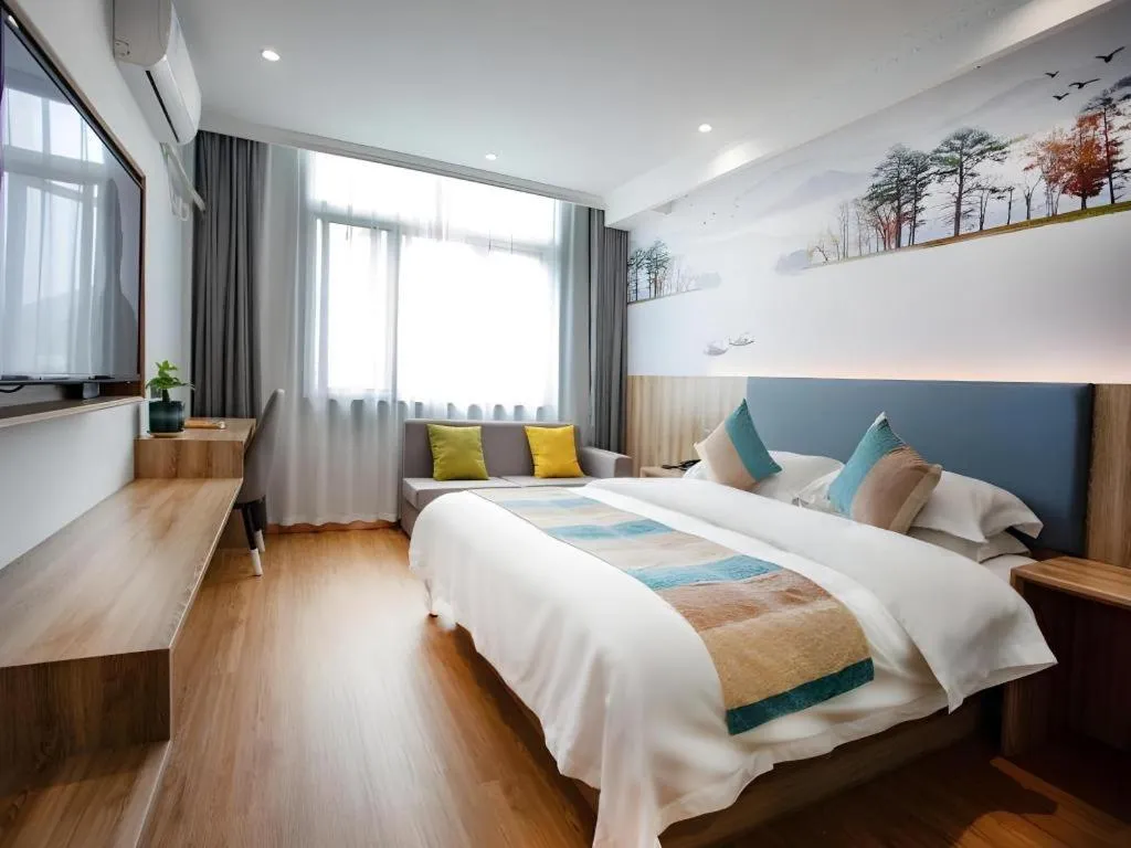 Bed in VX Hotel Hangzhou Banshan