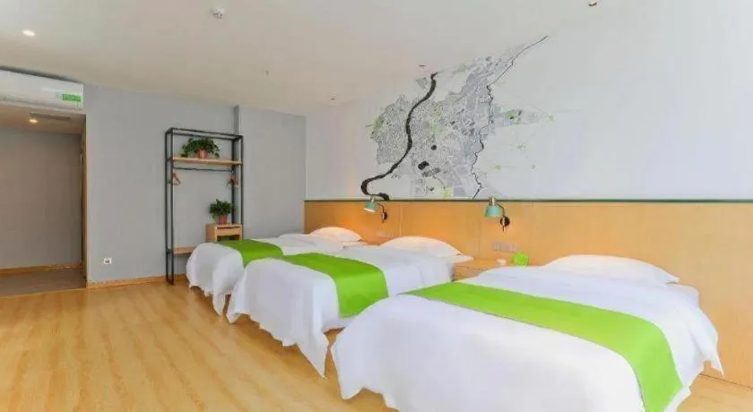 Bed in Vatica Hotel Hefei Yaohai Longgang Subway Station