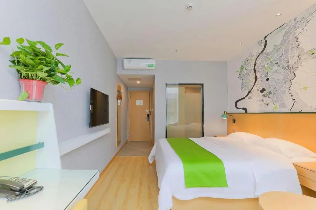 Bed in Vatica Hotel Hefei Yaohai Longgang Subway Station