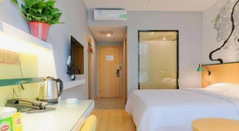 Bed in Vatica Hotel Hefei Yaohai Longgang Subway Station