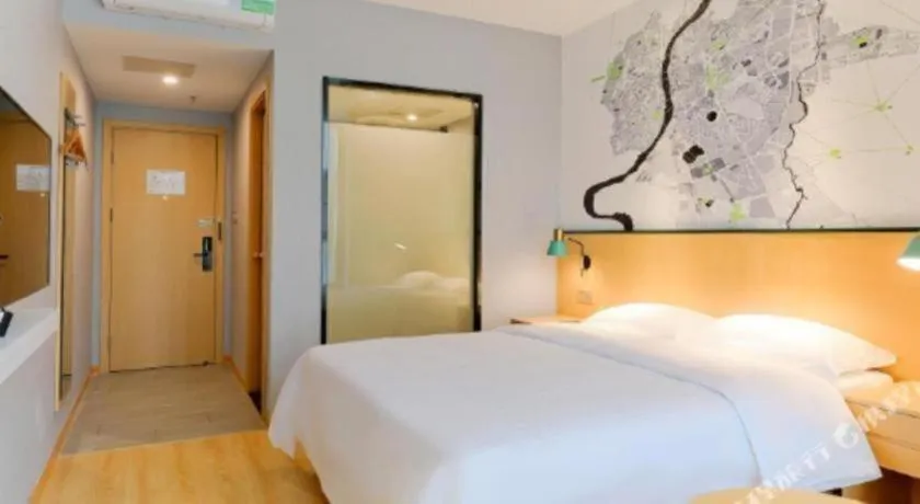 Bed in Vatica Hotel Hefei Yaohai Longgang Subway Station