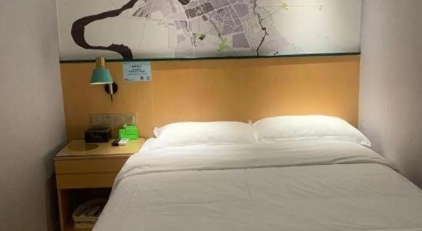 Bed in Vatica Hotel Hefei Yaohai Longgang Subway Station
