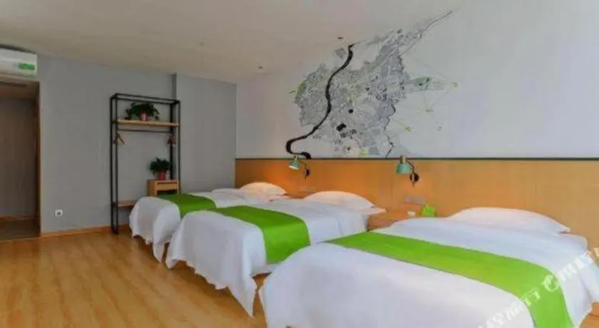 Bed in Vatica Hotel Hefei Yaohai Longgang Subway Station