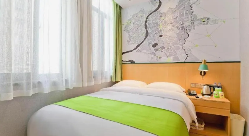 Bed in Vatica Hotel Hefei Yaohai Longgang Subway Station