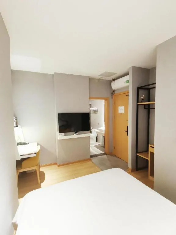 Bed in Vatica Hotel Hefei Yaohai Longgang Subway Station