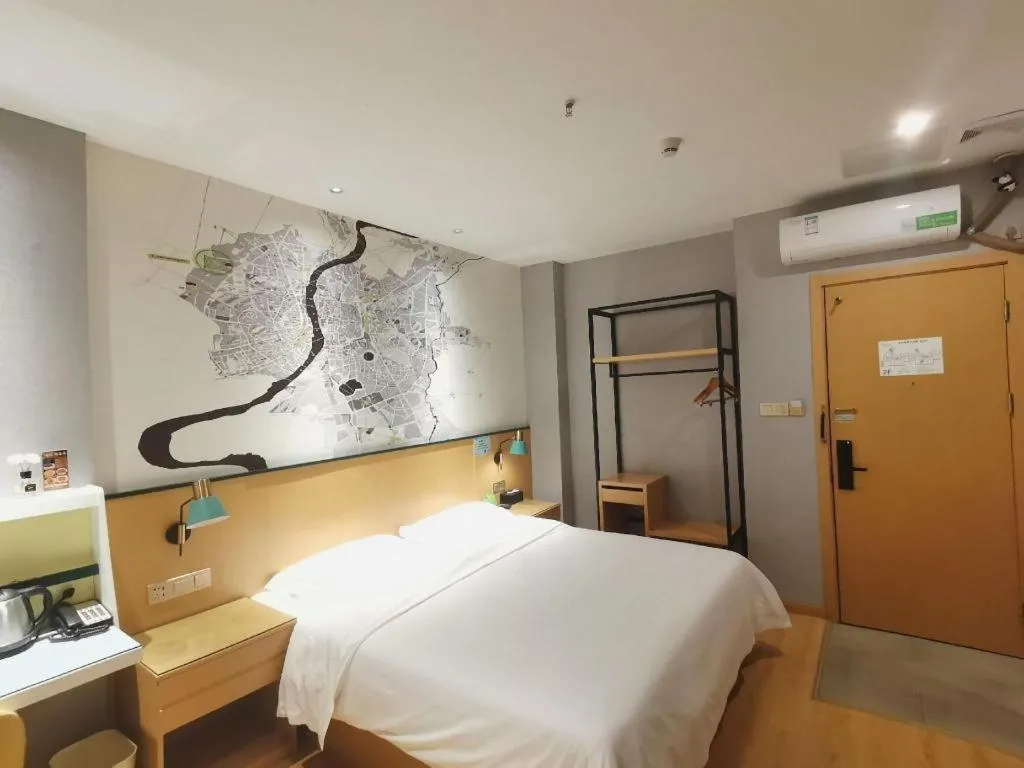 Bed in Vatica Hotel Hefei Yaohai Longgang Subway Station