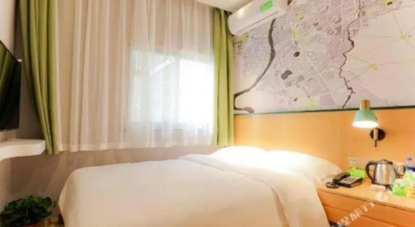 Bed in Vatica Hotel Hefei Yaohai Longgang Subway Station