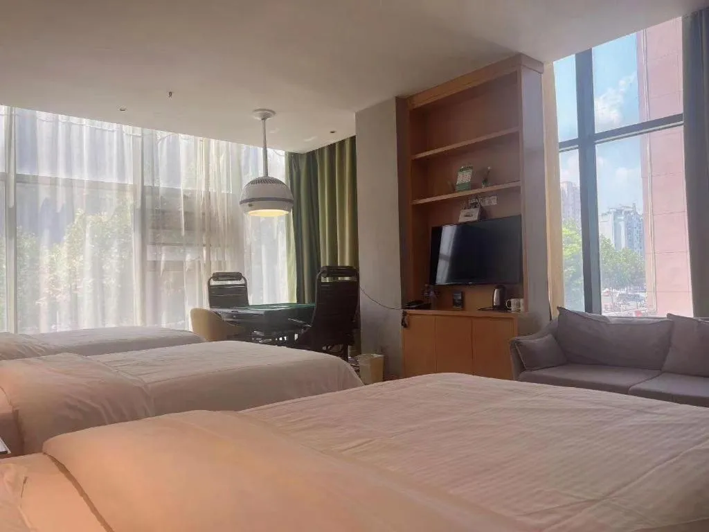 Bed in Vatica Hotel Hefei Yaohai Longgang Subway Station