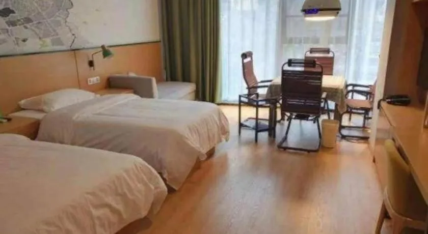 Bed in Vatica Hotel Hefei Yaohai Longgang Subway Station