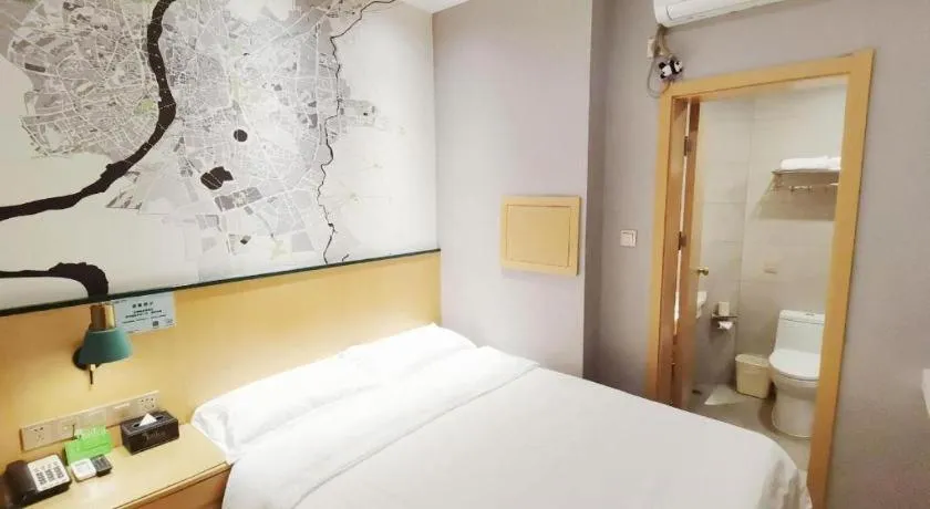 Bed in Vatica Hotel Hefei Yaohai Longgang Subway Station