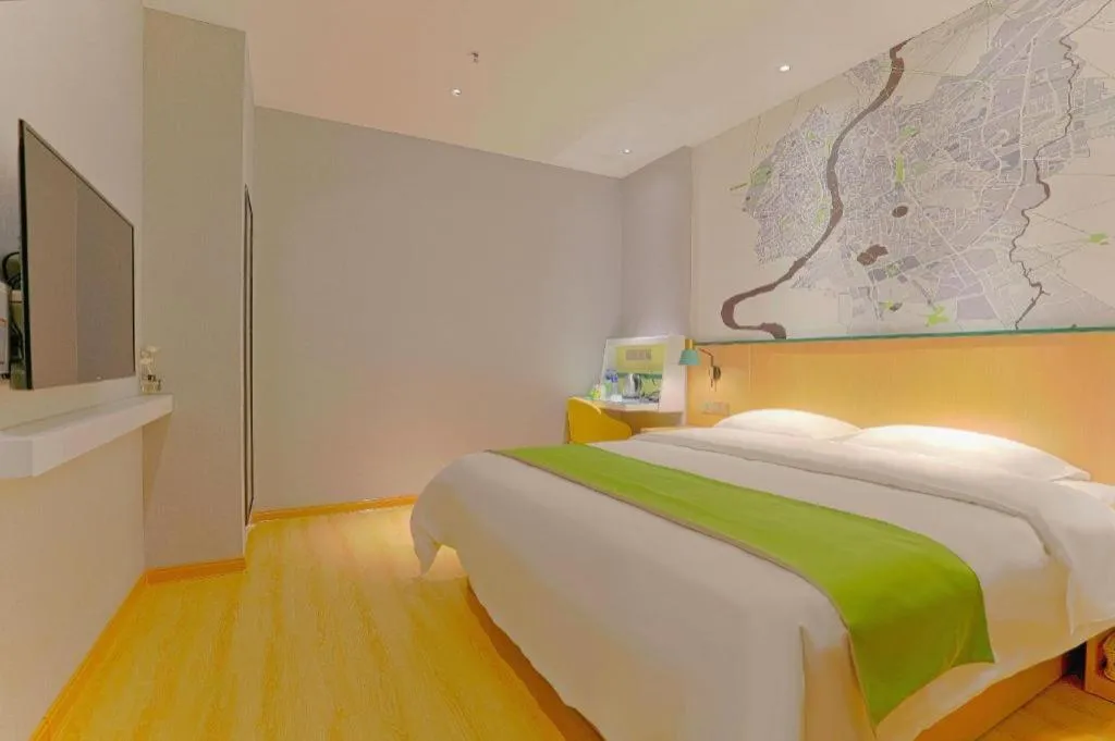 Bed in Vatica Hotel Hefei Yaohai Longgang Subway Station