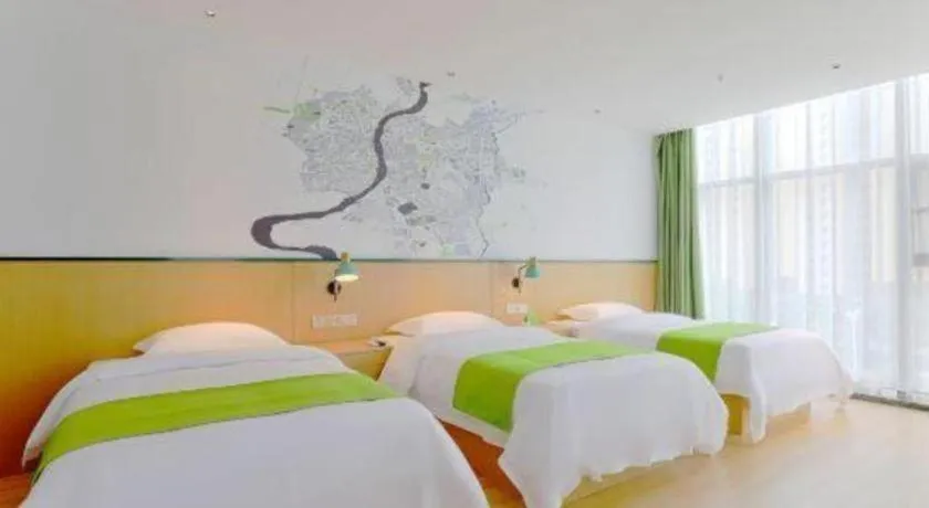 Bed in Vatica Hotel Hefei Yaohai Longgang Subway Station