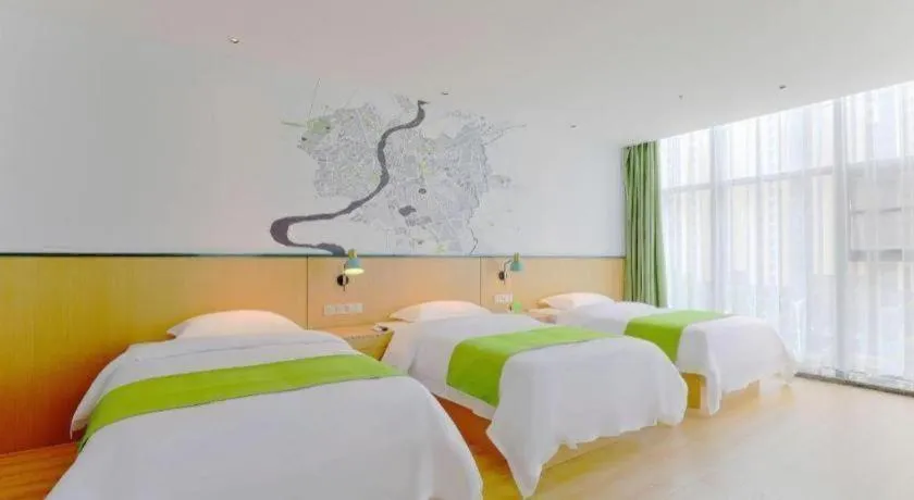 Bed in Vatica Hotel Hefei Yaohai Longgang Subway Station