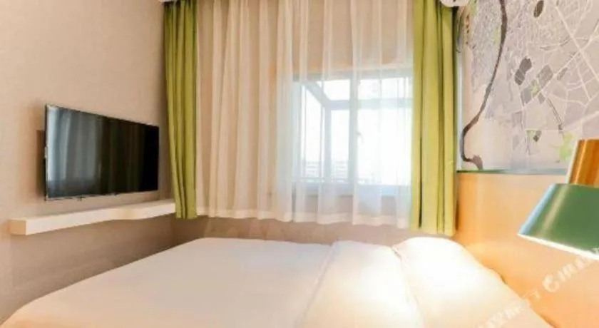 Bed in Vatica Hotel Hefei Yaohai Longgang Subway Station