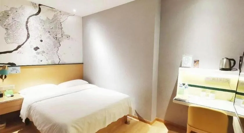 Bed in Vatica Hotel Hefei Yaohai Longgang Subway Station