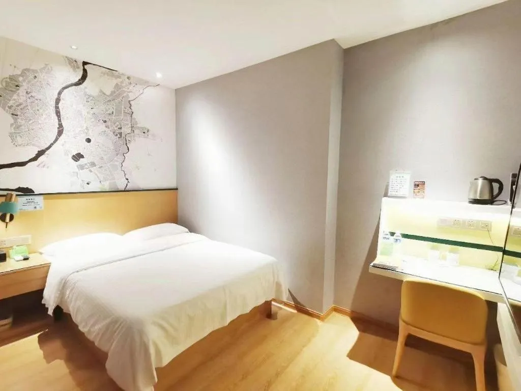 Bed in Vatica Hotel Hefei Yaohai Longgang Subway Station