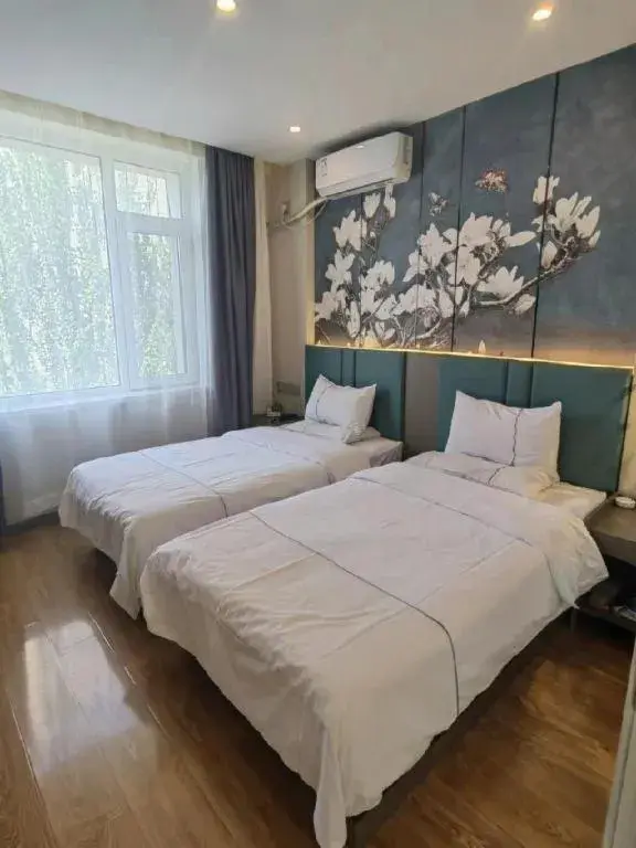 Bed in GreenTree Inn Shenyang Huanggu District Union Building Bed in GreenTree Inn Shenyang Huanggu District Union Building