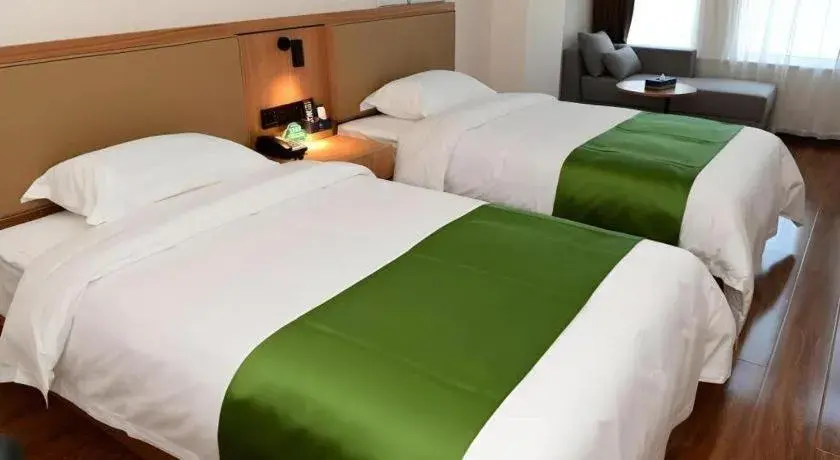 Bed in GreenTree Inn Xingta Songjing Street Financial Center Bed in GreenTree Inn Xingta Songjing Street Financial Center