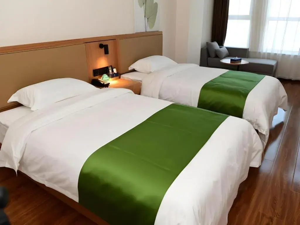 Bed in GreenTree Inn Xingta Songjing Street Financial Center Bed in GreenTree Inn Xingta Songjing Street Financial Center
