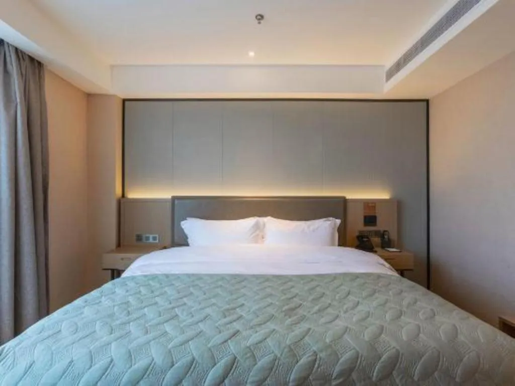 Bed in Gya Hotel Nantong Nanshang Lake Street Wanda Plaza