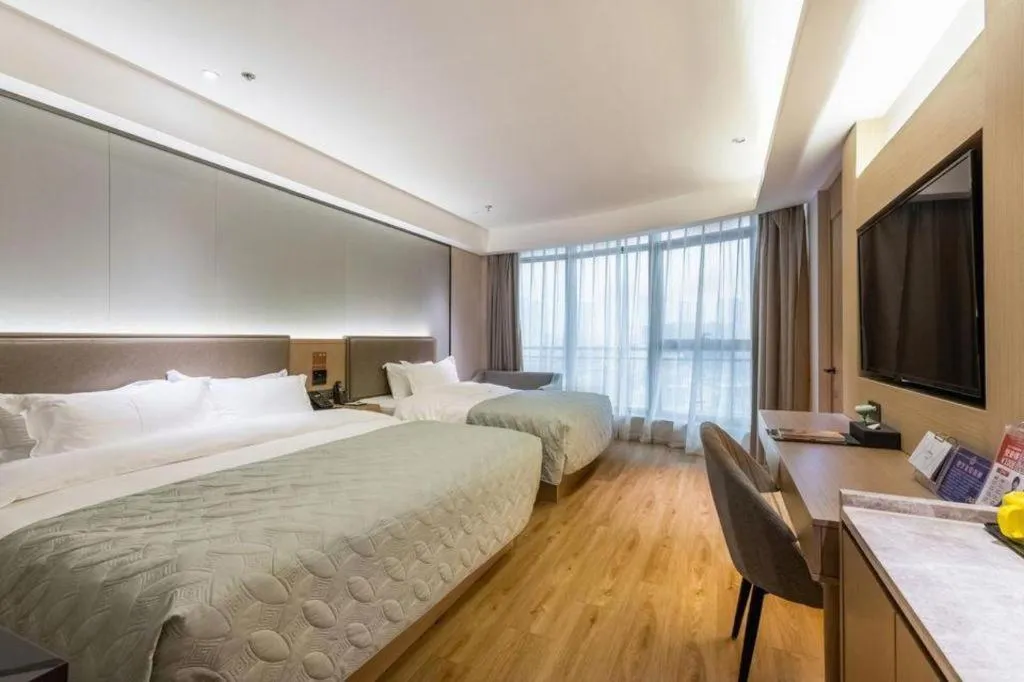 Bed in Gya Hotel Nantong Nanshang Lake Street Wanda Plaza