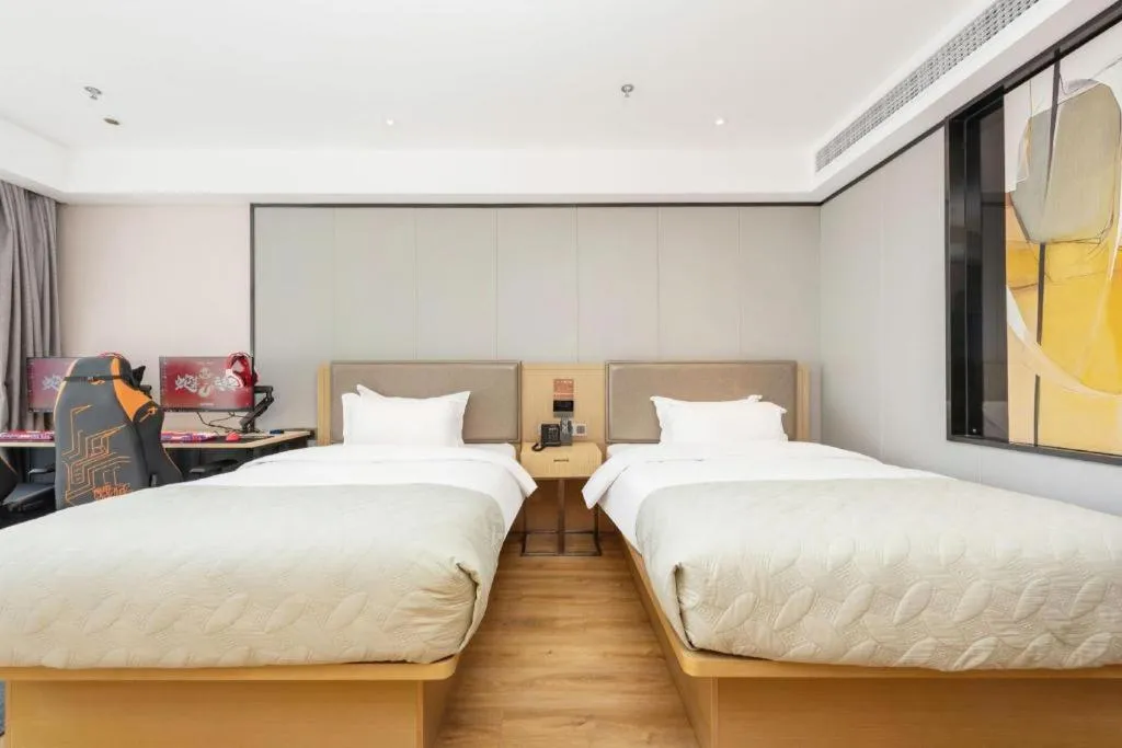 Bed in Gya Hotel Nantong Nanshang Lake Street Wanda Plaza