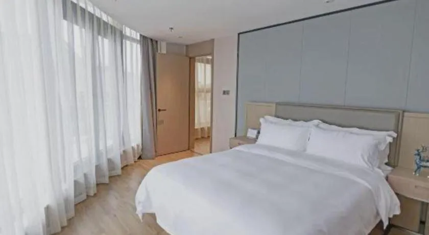 Bed in Gya Hotel Nantong Nanshang Lake Street Wanda Plaza