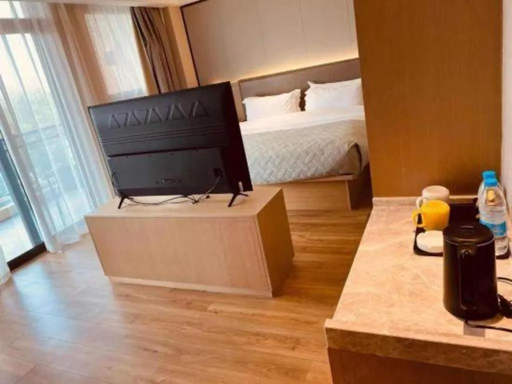 Bed in Gya Hotel Nantong Nanshang Lake Street Wanda Plaza