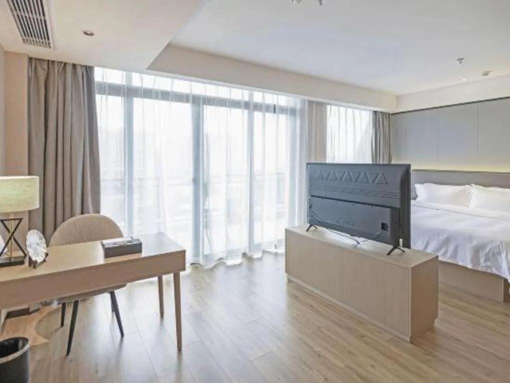 Bed in Gya Hotel Nantong Nanshang Lake Street Wanda Plaza