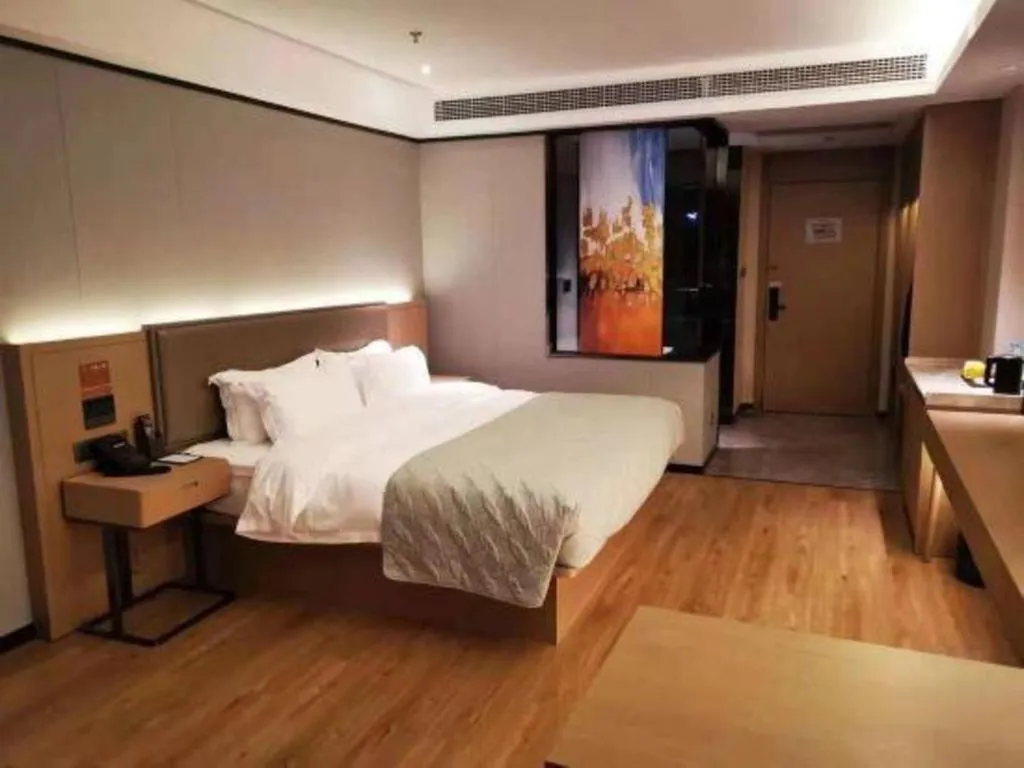 Bed in Gya Hotel Nantong Nanshang Lake Street Wanda Plaza