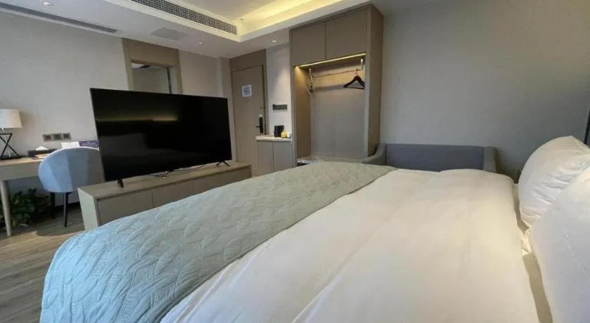 Bed in Gya Hotel Nantong Nanshang Lake Street Wanda Plaza