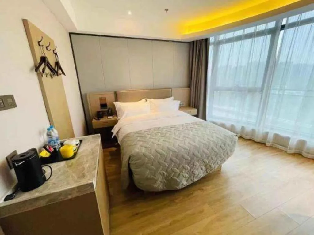Bed in Gya Hotel Nantong Nanshang Lake Street Wanda Plaza