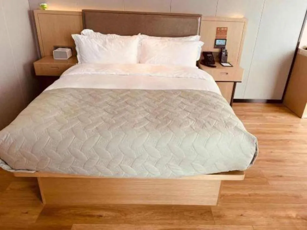 Bed in Gya Hotel Nantong Nanshang Lake Street Wanda Plaza