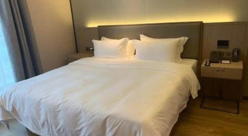 Bed in Gya Hotel Nantong Nanshang Lake Street Wanda Plaza