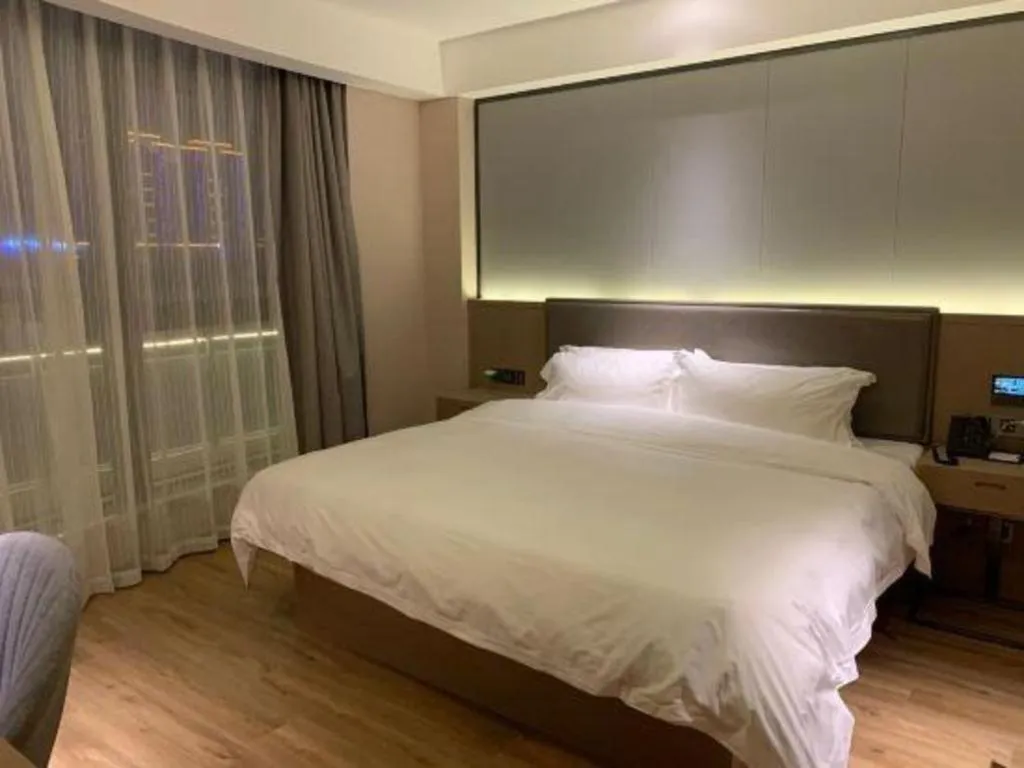 Bed in Gya Hotel Nantong Nanshang Lake Street Wanda Plaza