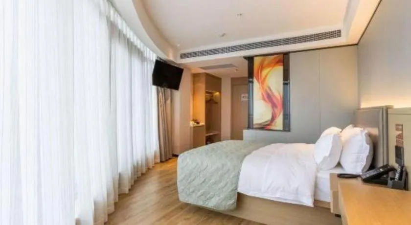 Bed in Gya Hotel Nantong Nanshang Lake Street Wanda Plaza