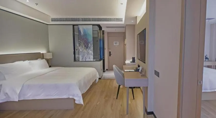 Bed in Gya Hotel Nantong Nanshang Lake Street Wanda Plaza