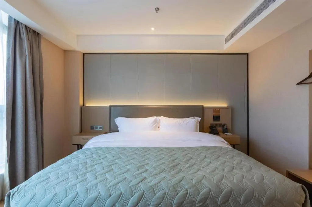 Bed in Gya Hotel Nantong Nanshang Lake Street Wanda Plaza
