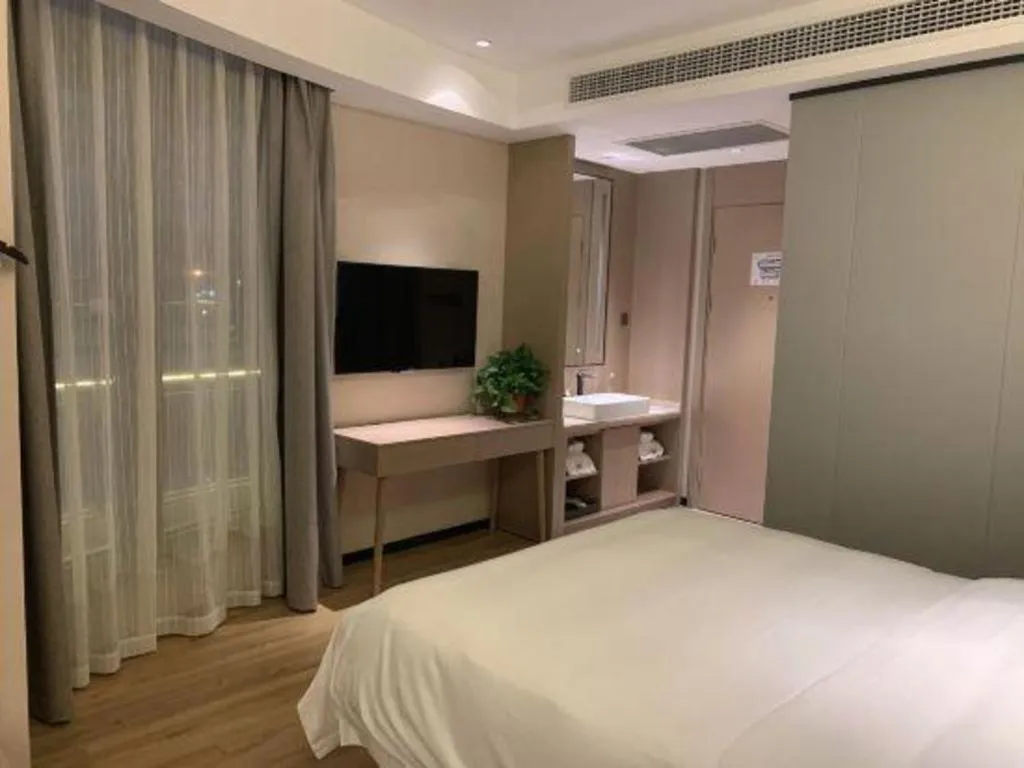 Bed in Gya Hotel Nantong Nanshang Lake Street Wanda Plaza
