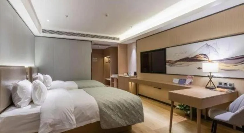 Bed in Gya Hotel Nantong Nanshang Lake Street Wanda Plaza