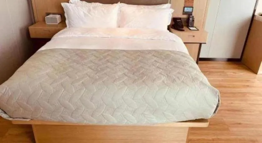 Bed in Gya Hotel Nantong Nanshang Lake Street Wanda Plaza
