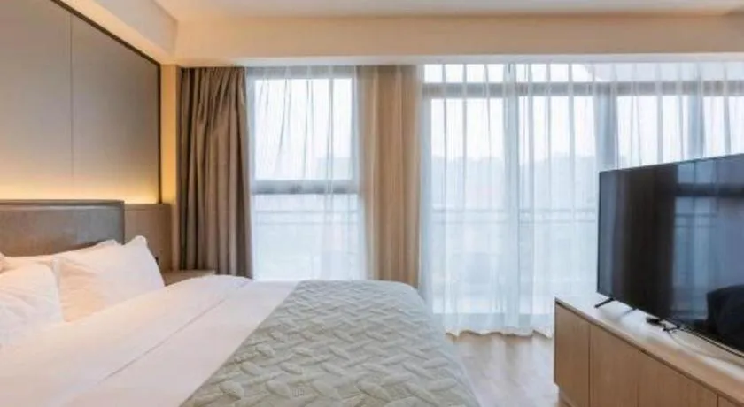 Bed in Gya Hotel Nantong Nanshang Lake Street Wanda Plaza