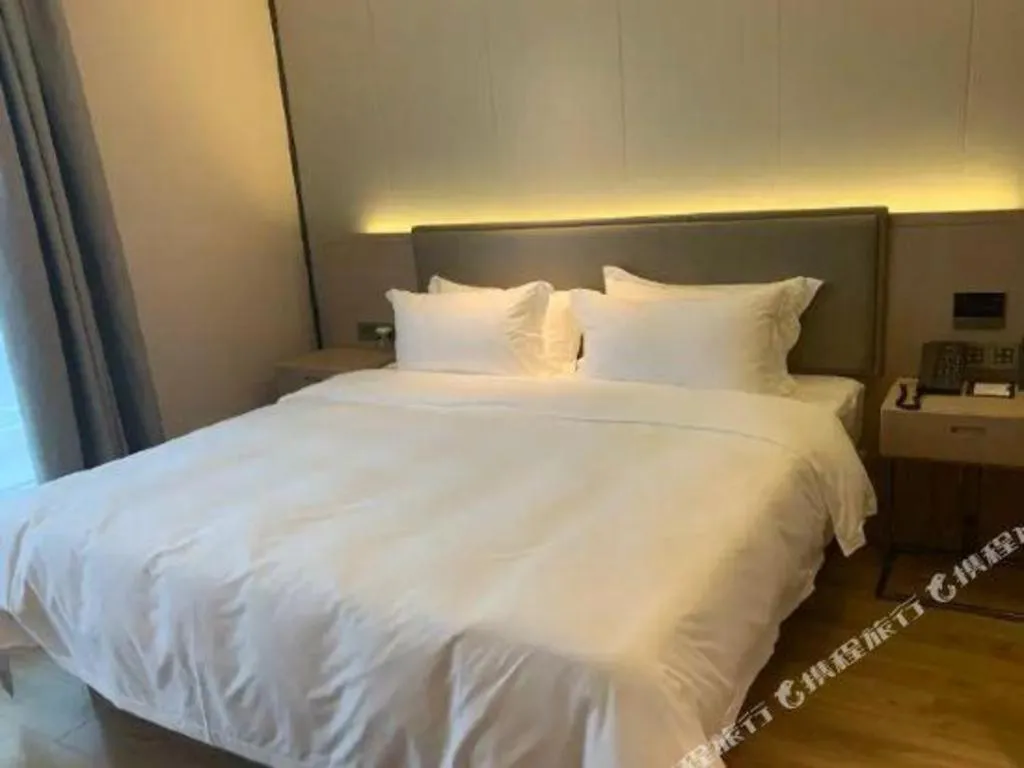 Bed in Gya Hotel Nantong Nanshang Lake Street Wanda Plaza