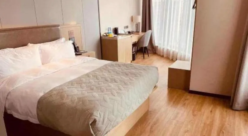 Bed in Gya Hotel Nantong Nanshang Lake Street Wanda Plaza