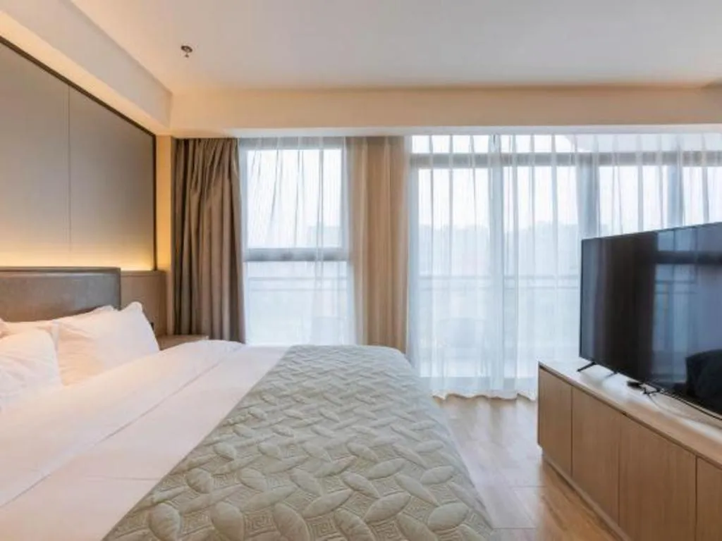 Bed in Gya Hotel Nantong Nanshang Lake Street Wanda Plaza