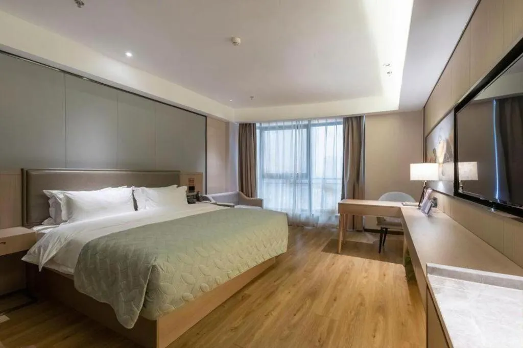 Bed in Gya Hotel Nantong Nanshang Lake Street Wanda Plaza