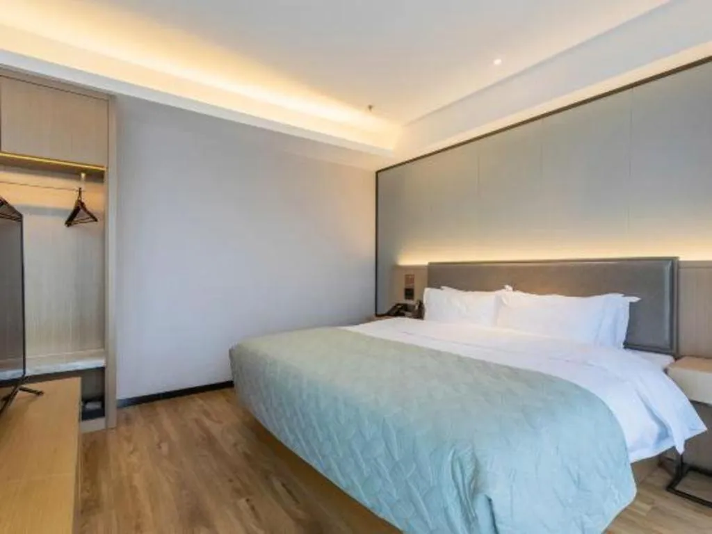 Bed in Gya Hotel Nantong Nanshang Lake Street Wanda Plaza