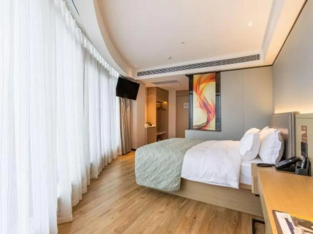 Bed in Gya Hotel Nantong Nanshang Lake Street Wanda Plaza