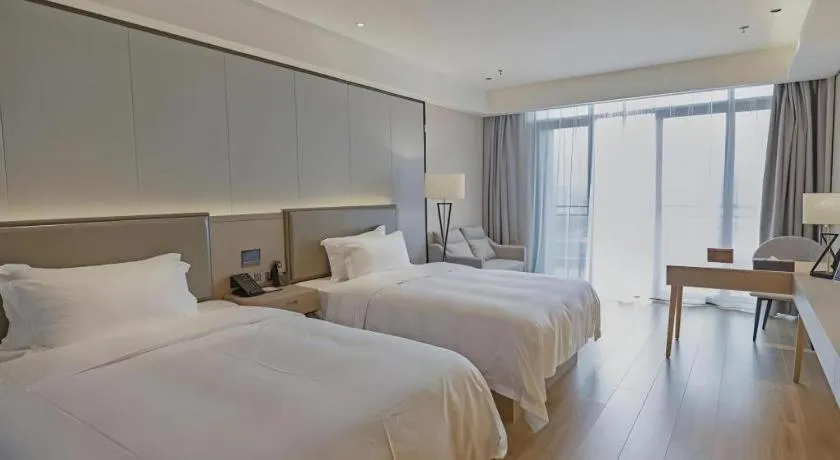 Bed in Gya Hotel Nantong Nanshang Lake Street Wanda Plaza